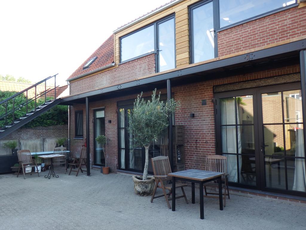 De Weegbrug Hotel IJzendijke Bagian luar foto