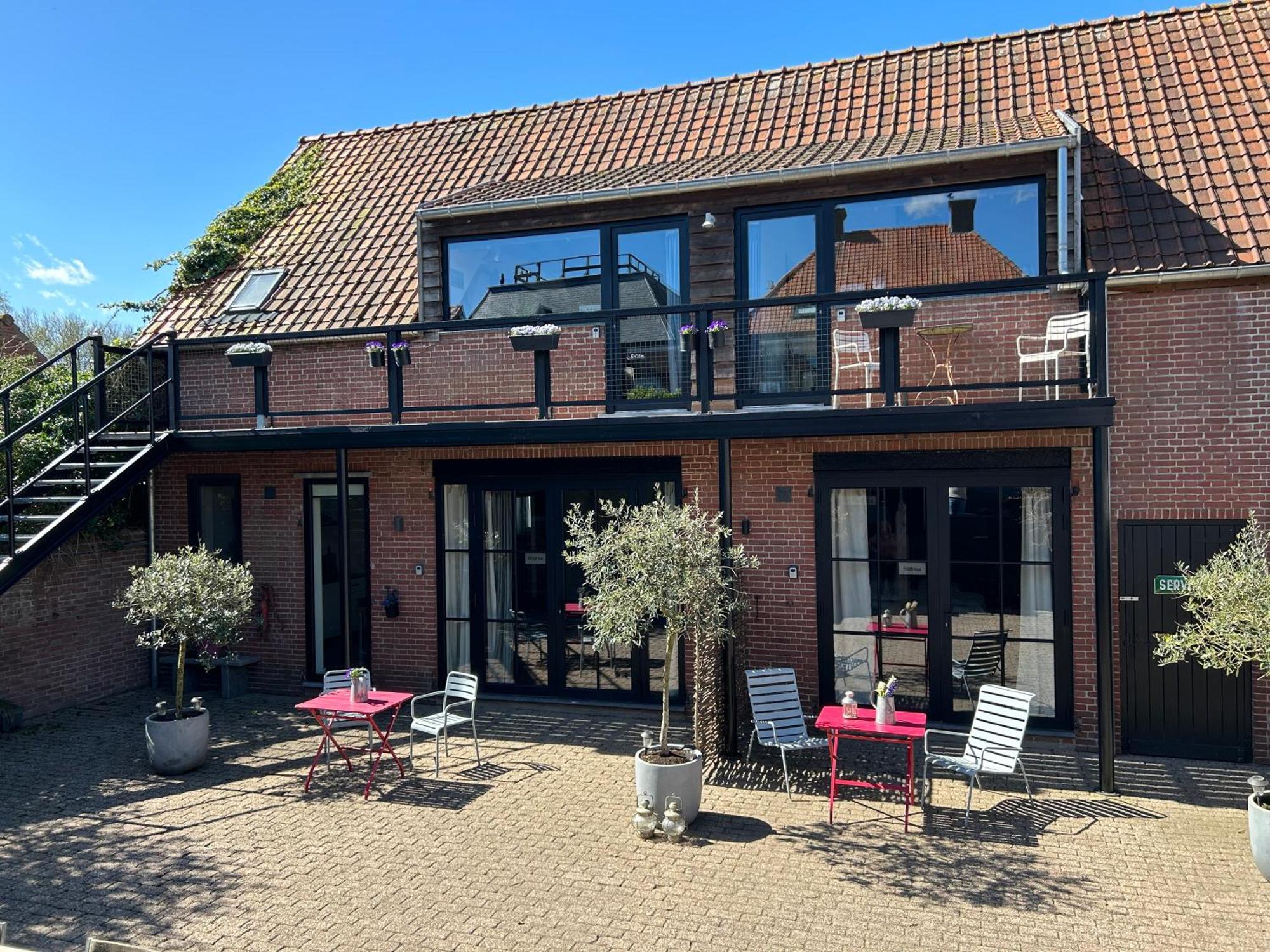 De Weegbrug Hotel IJzendijke Bagian luar foto